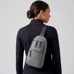 NEW! TUMI Ariana Stylish Gray Sling Bag